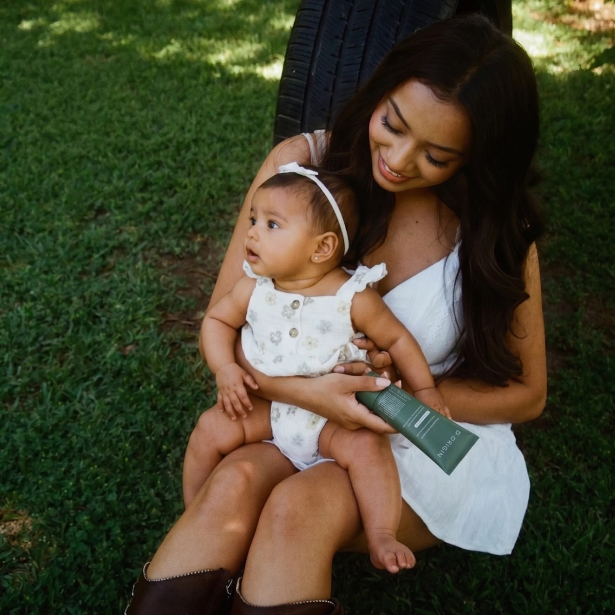 Mother and child with protective care product